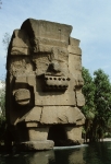 Stone god (front of museum)